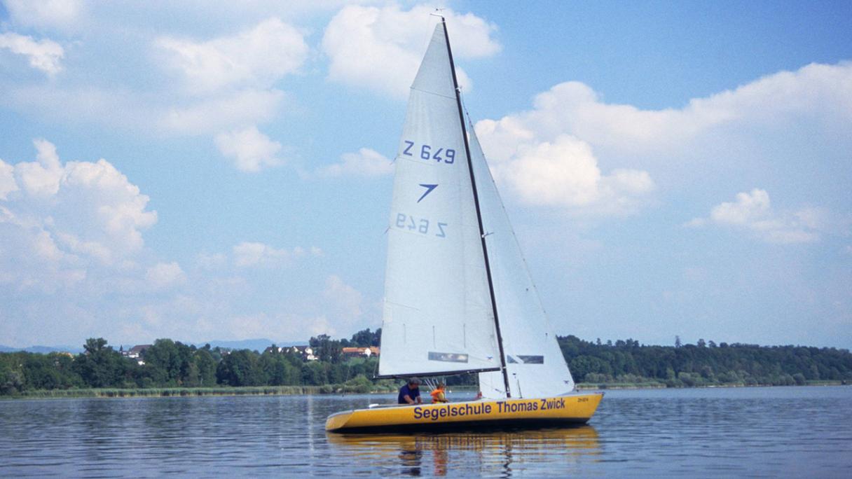 Sail boat of the sailing school Thomas Zwick on the lake