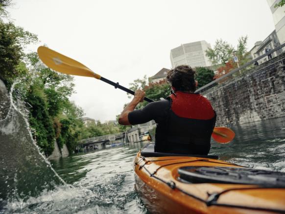 Matteo kayaking through the city, Zurich